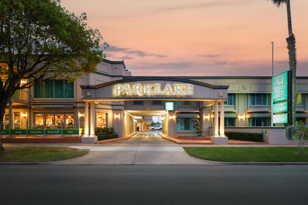 a building with a parking garage in front of it at Quality Hotel Parklake Shepparton in Shepparton
