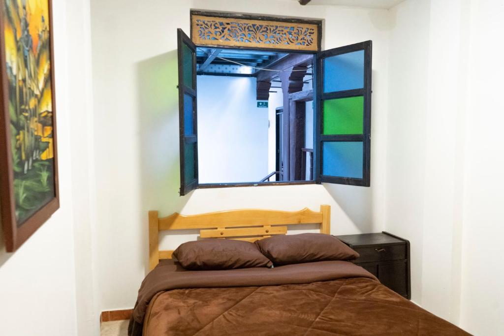 Postel nebo postele na pokoji v ubytování Casa Tsao