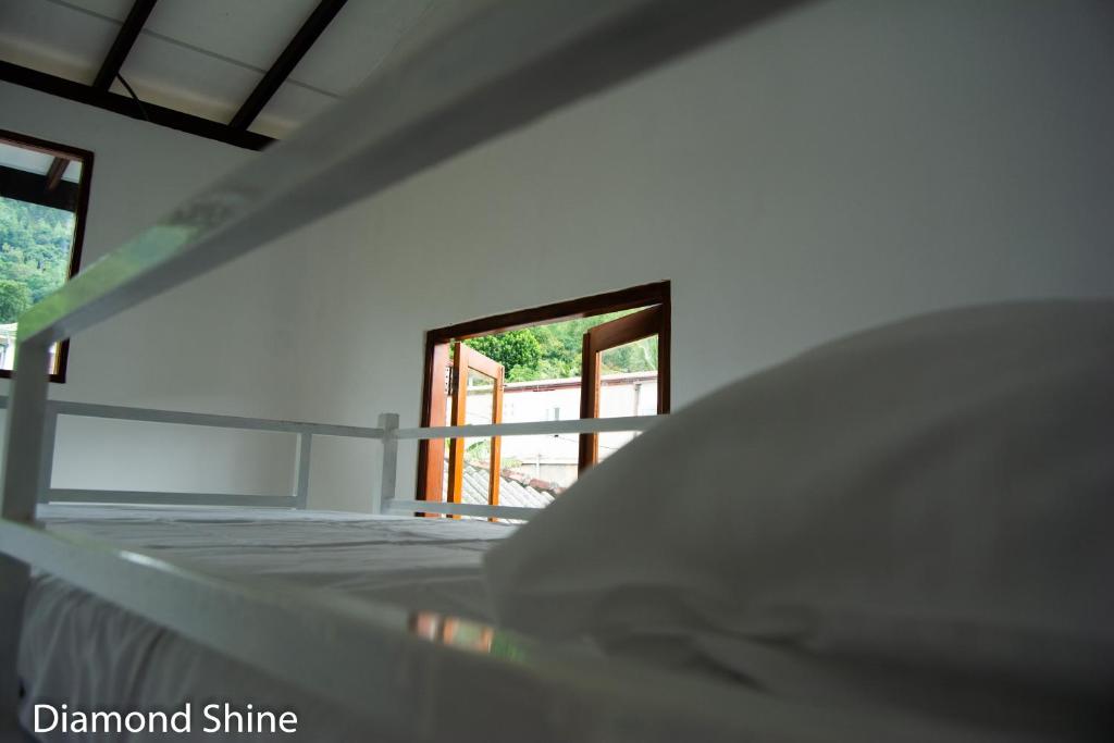 Postel nebo postele na pokoji v ubytování Diamond shine hostal and bunk beds