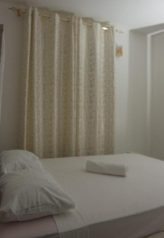 Postel nebo postele na pokoji v ubytování Repher's Suite
