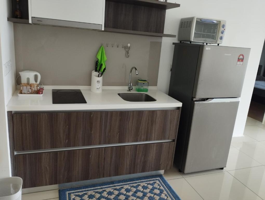 Nhà bếp/bếp nhỏ tại Cozy Luxe Condo in Southville City