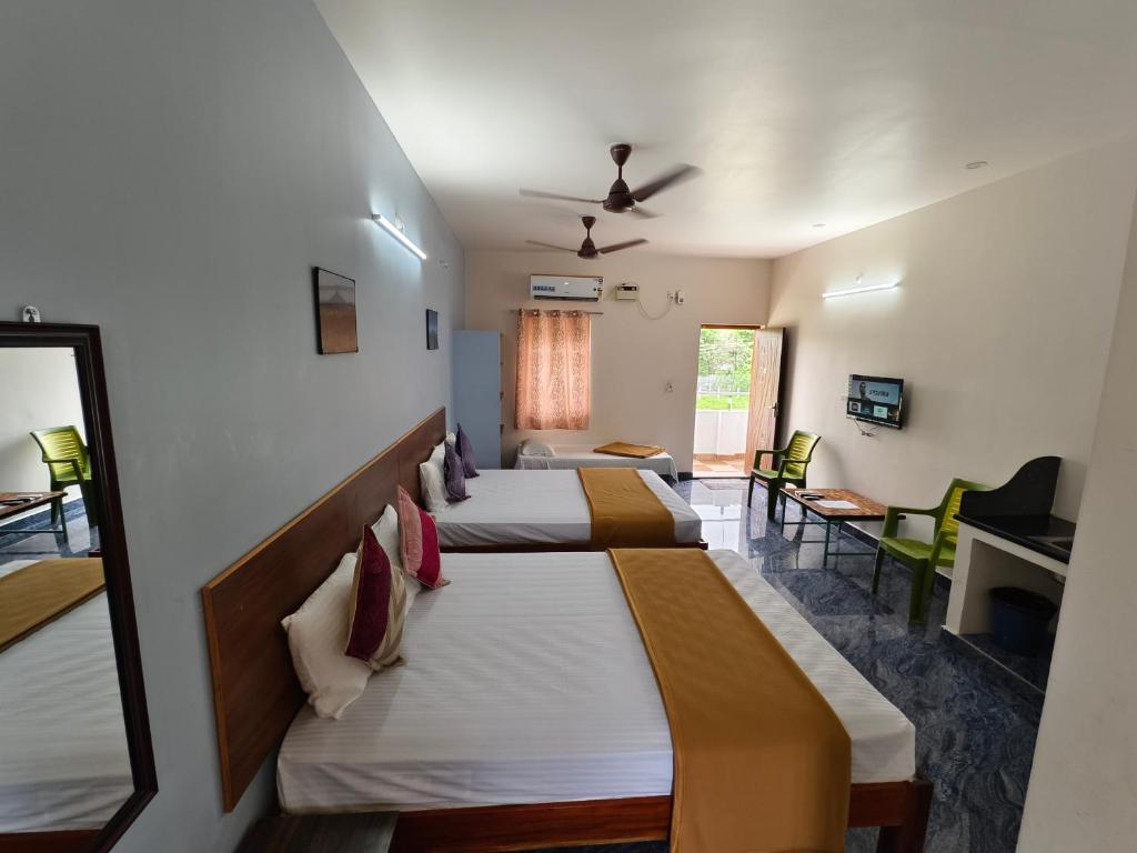 Postel nebo postele na pokoji v ubytování RPM home stay
