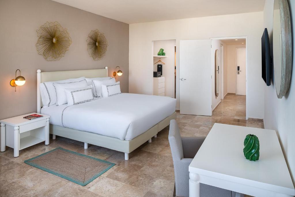 Postel nebo postele na pokoji v ubytování Melia Casa Maya Cancun All Inclusive