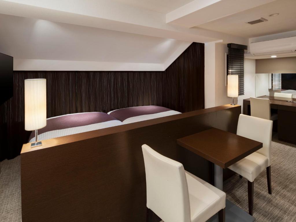 TV a/nebo společenská místnost v ubytování HOTEL MYSTAYS Iidabashi