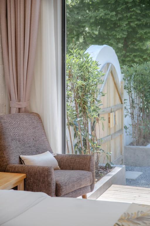Posezení v ubytování Vretreats yunxishang Boutique Hotel