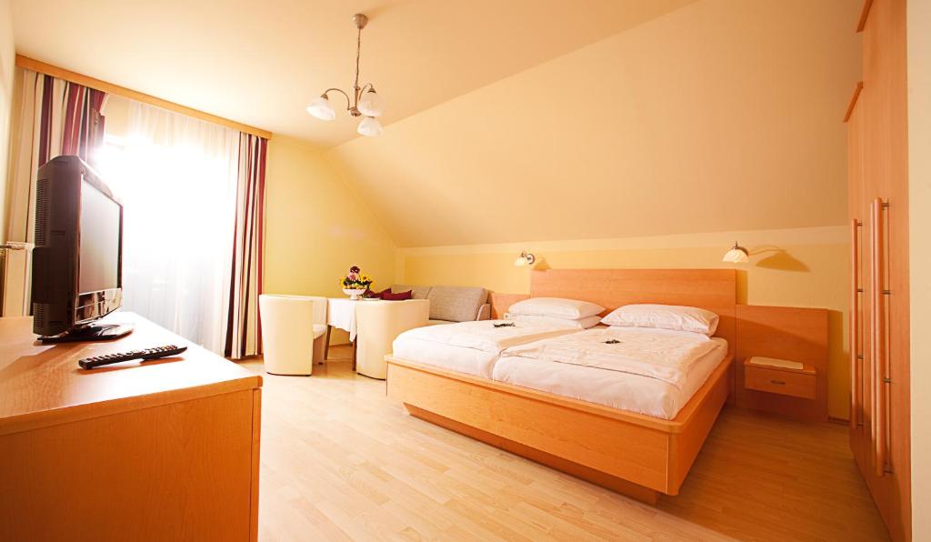 Postel nebo postele na pokoji v ubytování Hotel Mönichwalderhof
