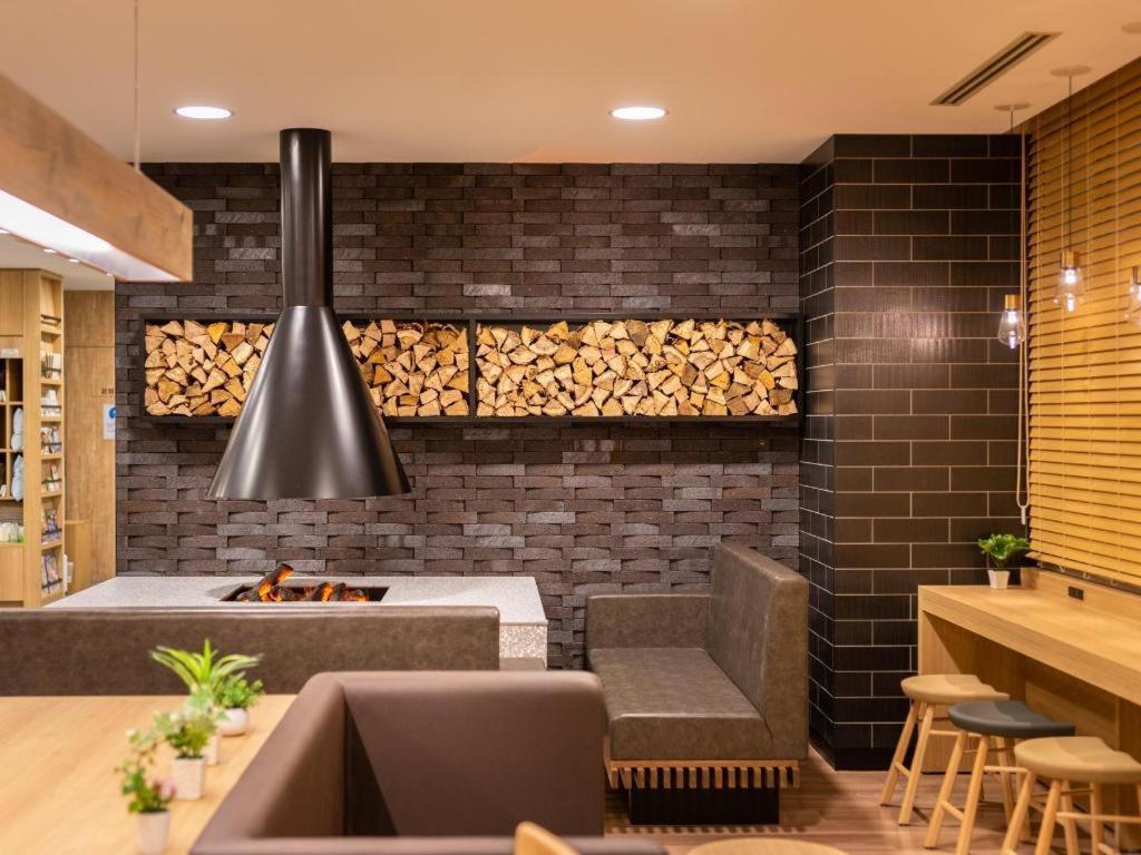 a kitchen with a stoveasteryasteryasteryasteryasteryasteryasteryasteryasteryasteryastery at Super Hotel Hakodate in Hakodate