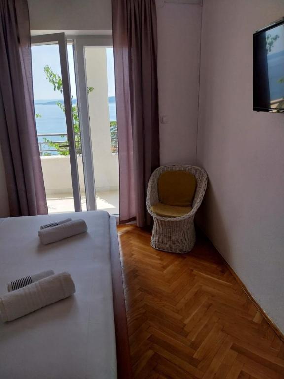 Postel nebo postele na pokoji v ubytování Apartments Josip