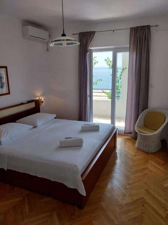 Postel nebo postele na pokoji v ubytování Apartments Josip
