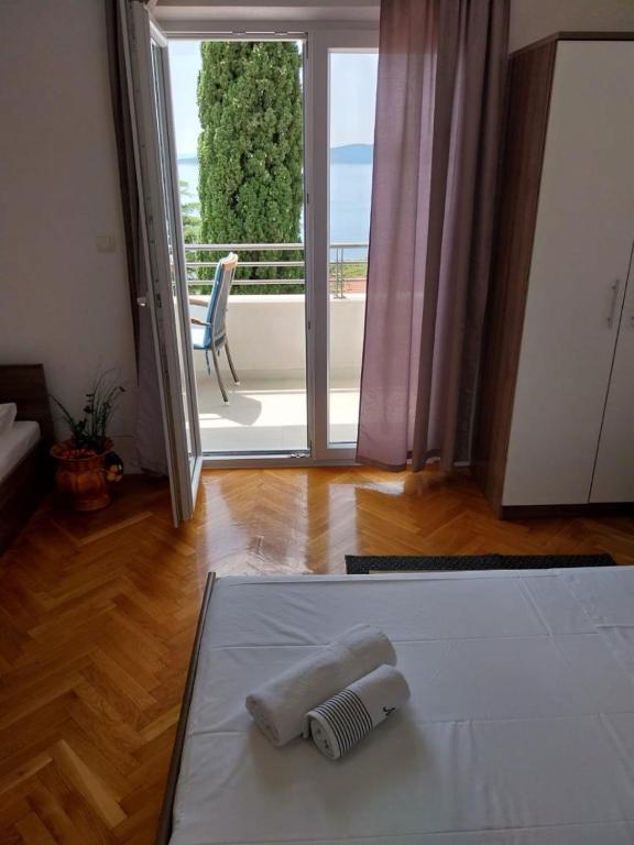 Postel nebo postele na pokoji v ubytování Apartments Josip