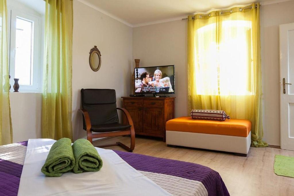 Posteľ alebo postele v izbe v ubytovaní Apartment Alta