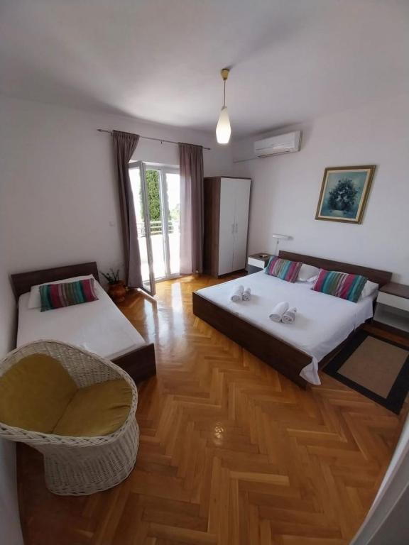 Postel nebo postele na pokoji v ubytování Apartments Josip