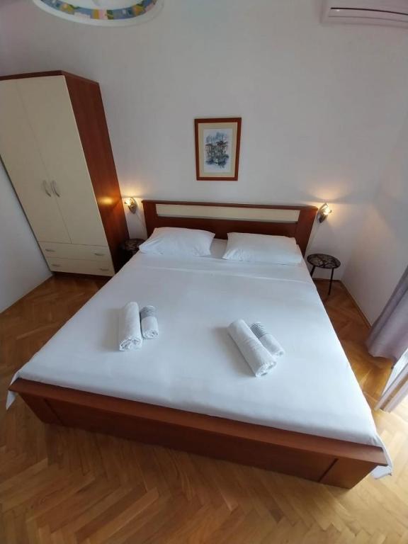 Postel nebo postele na pokoji v ubytování Apartments Josip