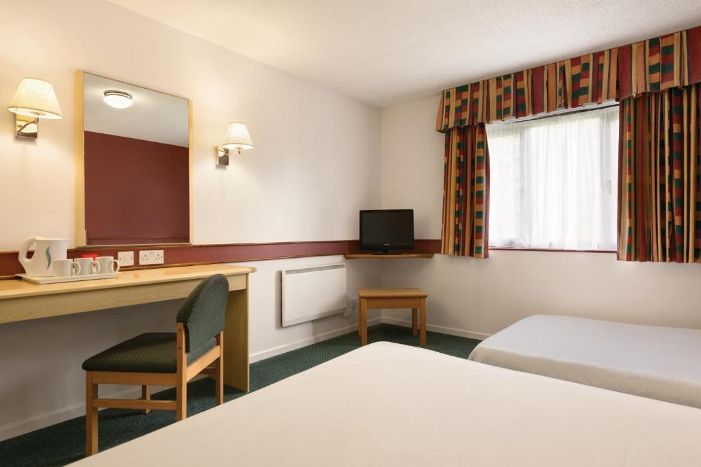 Postel nebo postele na pokoji v ubytování Days Inn Hotel Bradford - Leeds