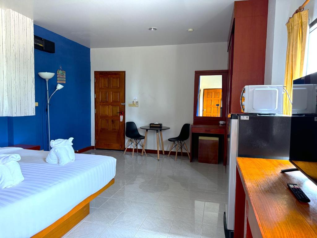 Postel nebo postele na pokoji v ubytování Diamond Place Ao Nang