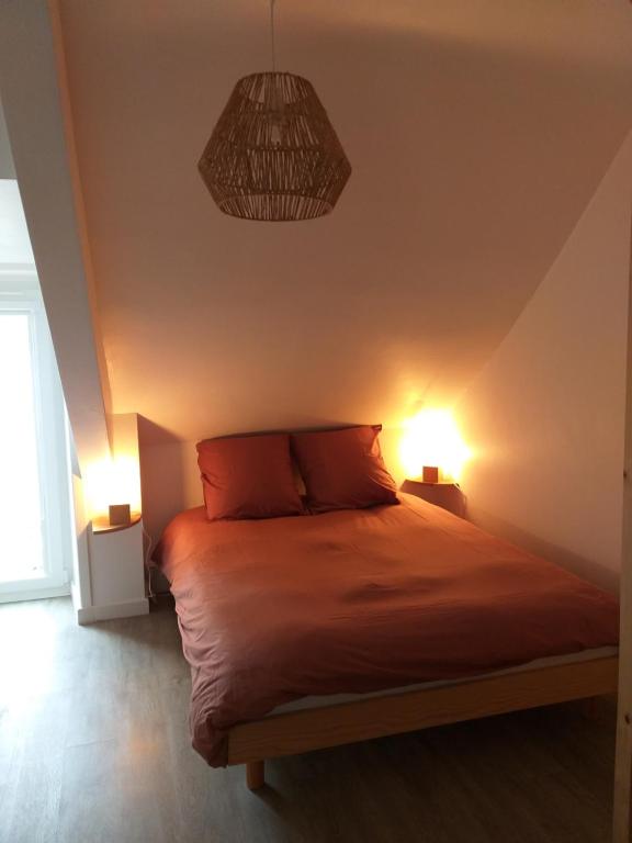 Postel nebo postele na pokoji v ubytování MANOIR ST YVES -Gîte