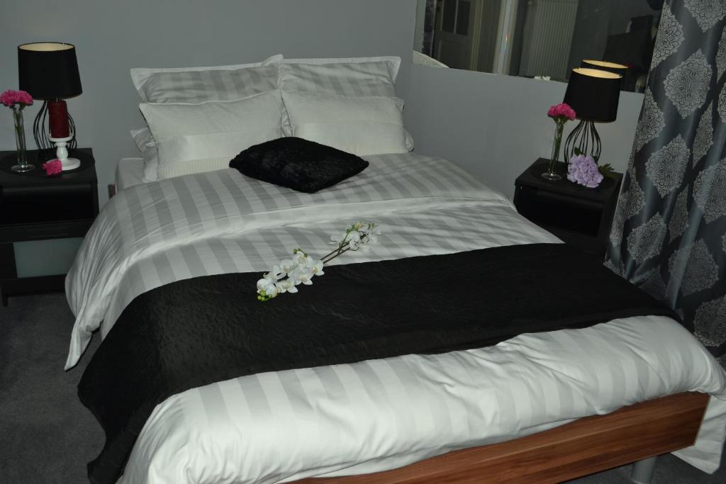 Postel nebo postele na pokoji v ubytování Hotel Het Gasthof
