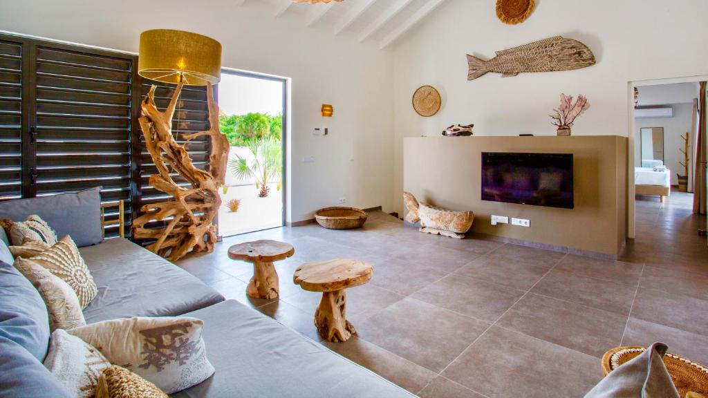 Posezení v ubytování The Villas by LXRYHOME