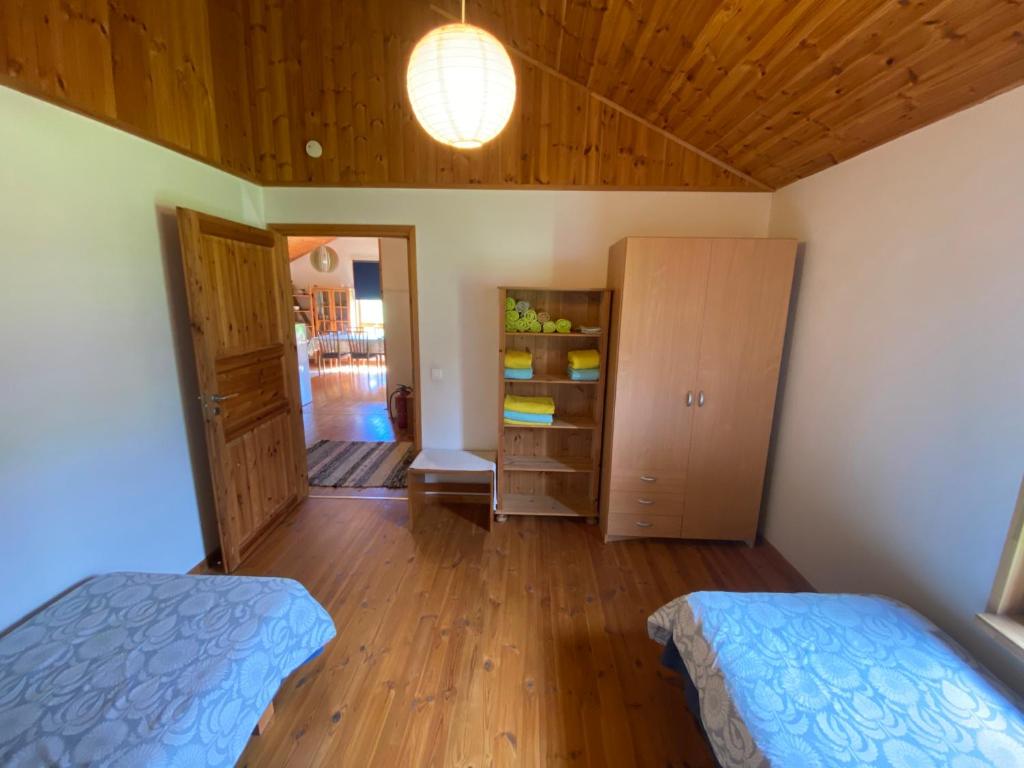 Postel nebo postele na pokoji v ubytování Kasteheina kodu