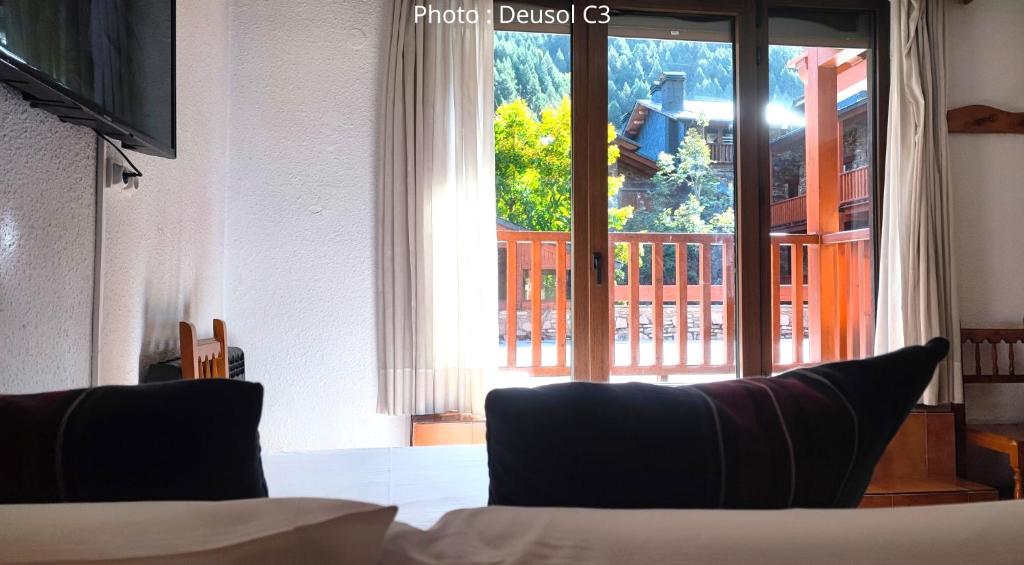 Postel nebo postele na pokoji v ubytování AC Apartaments Vall d'Incles