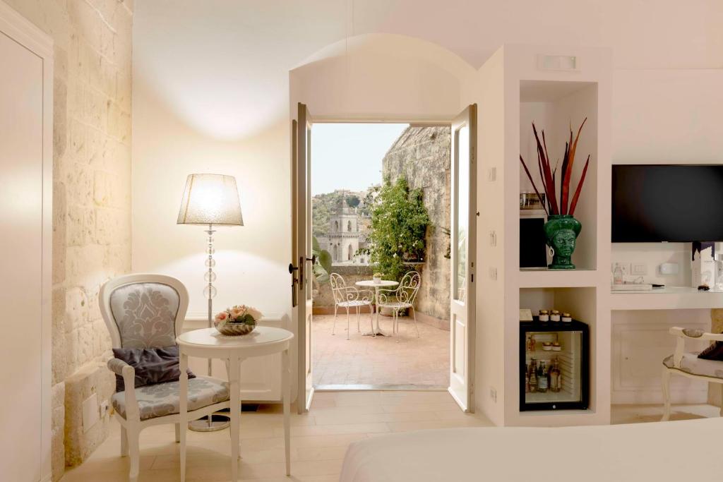 TV a/nebo společenská místnost v ubytování Sant'Angelo, Matera - Small Luxury Hotels