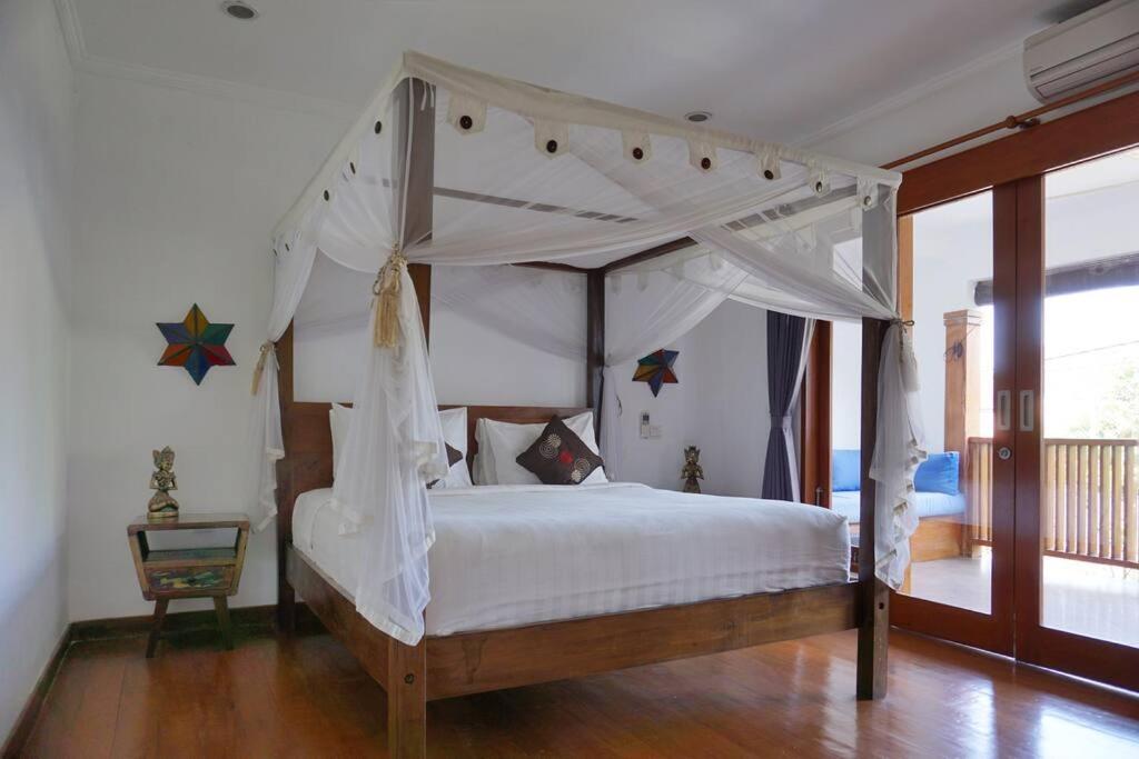 Katil atau katil-katil dalam bilik di T&J1 - Gorgeous 1BR pool villa, parking, walk to beach!