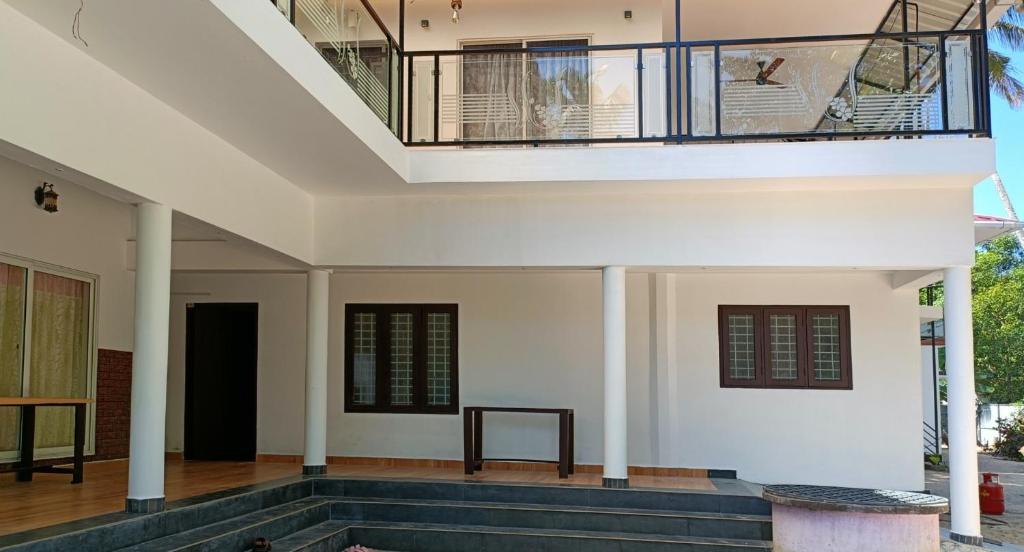 Balkón nebo terasa v ubytování Koshy's beach front Homestay
