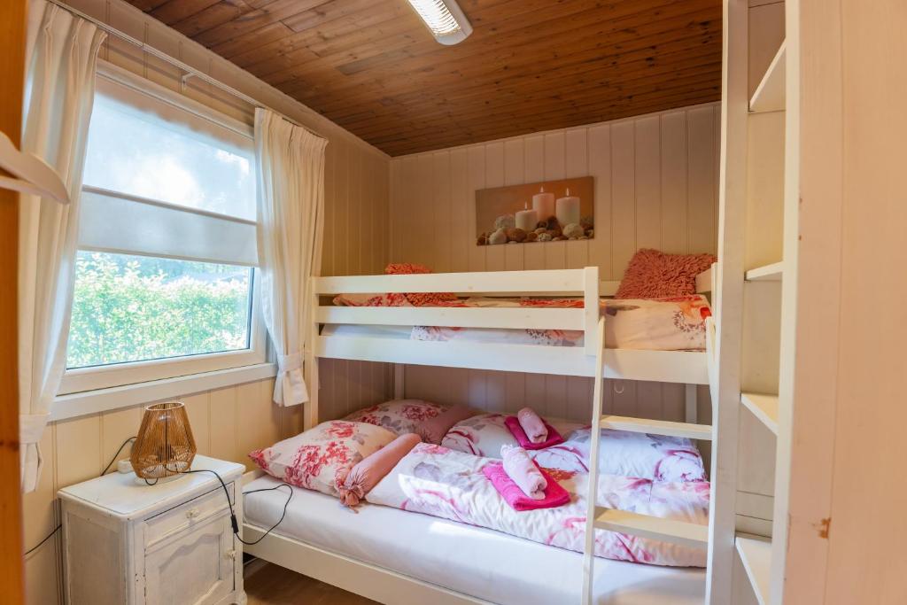 Postel nebo postele na pokoji v ubytování Chalet Luxe
