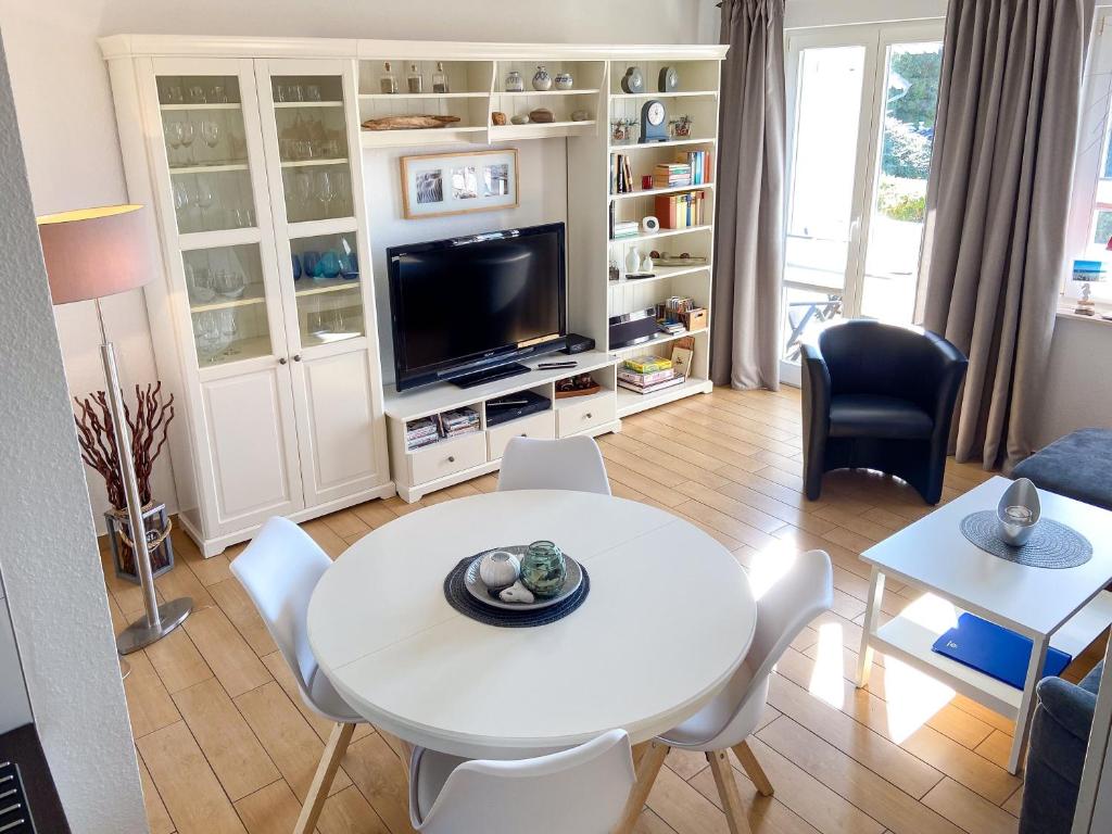 TV a/nebo společenská místnost v ubytování Wohnpark Stadt Hamburg - Apt. 50