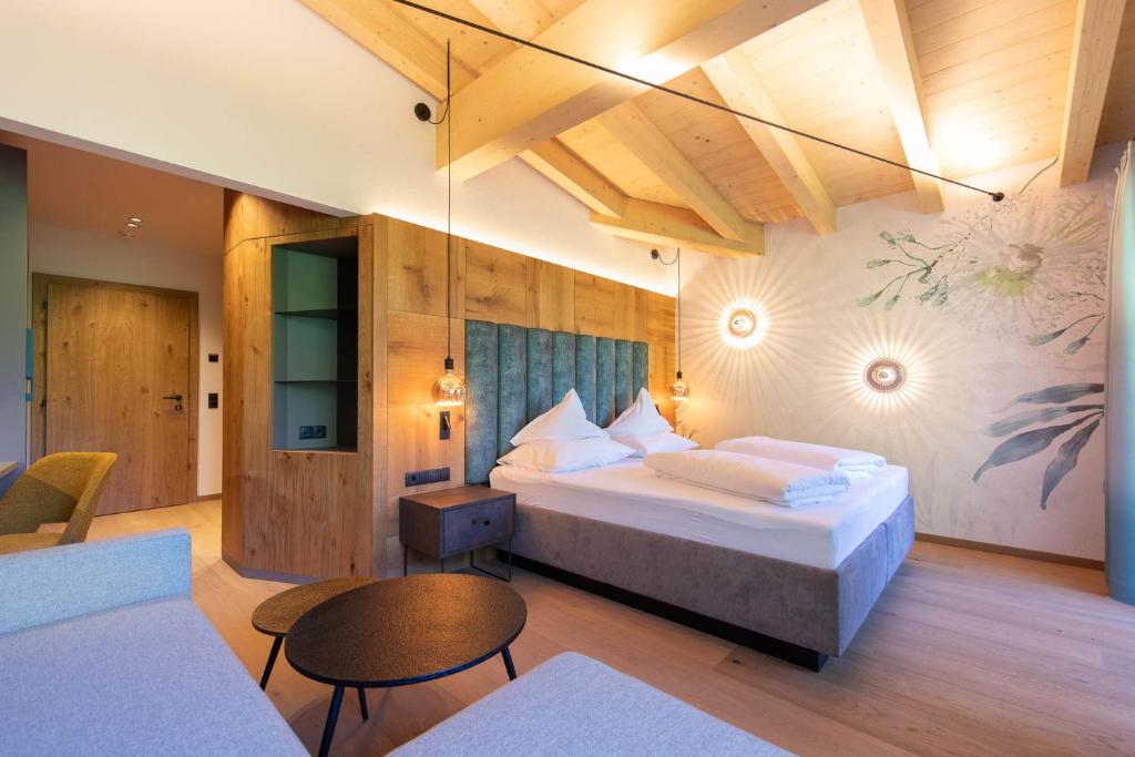 Postel nebo postele na pokoji v ubytování Hotel Pension Sonnleiten