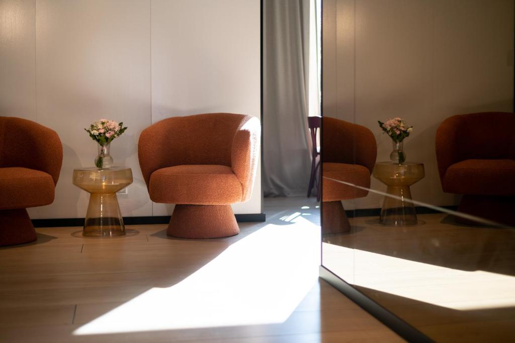 Posezení v ubytování Antares Hotel