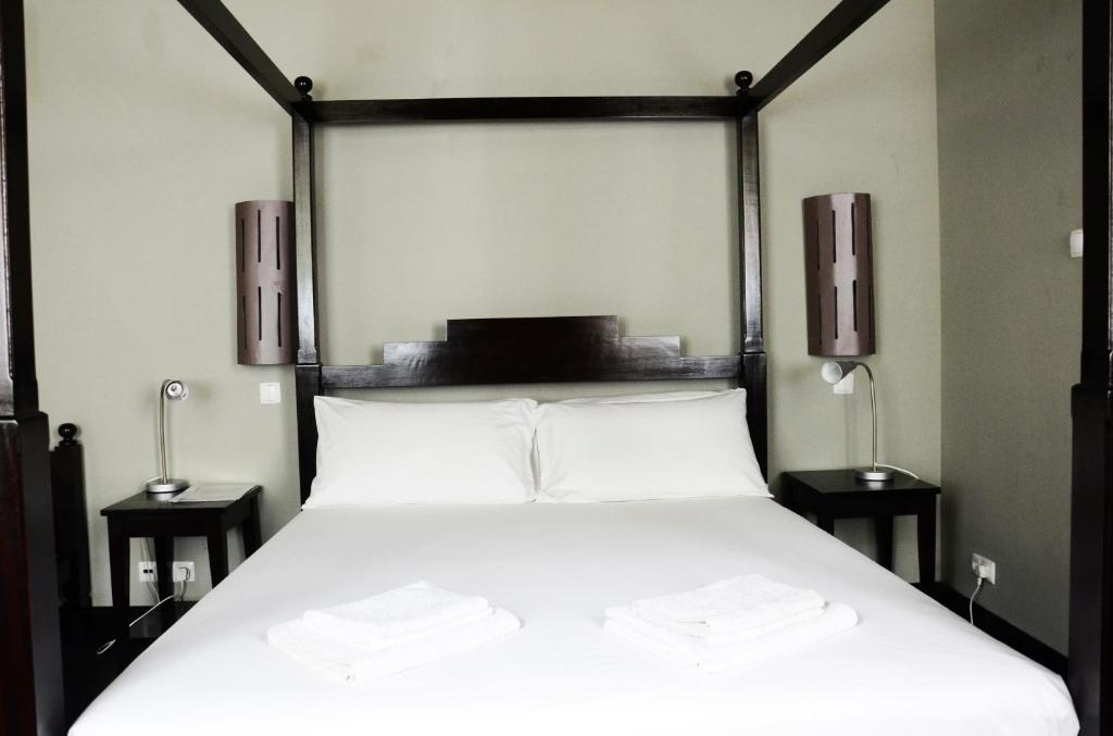 Postel nebo postele na pokoji v ubytování Casa Colonial