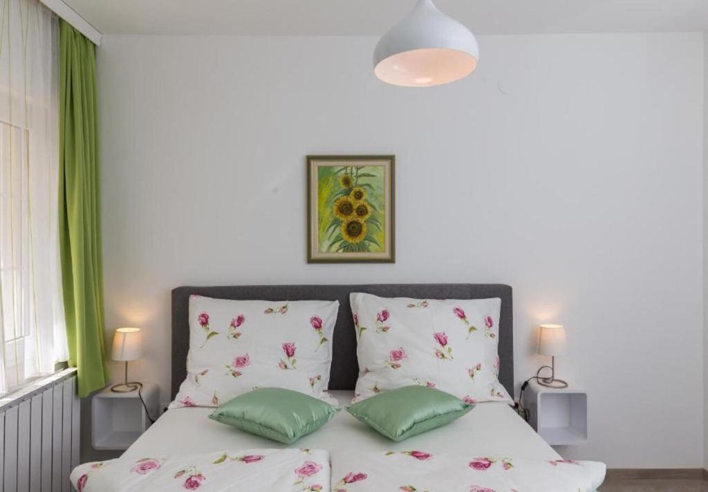 Posteľ alebo postele v izbe v ubytovaní Apartments Ante