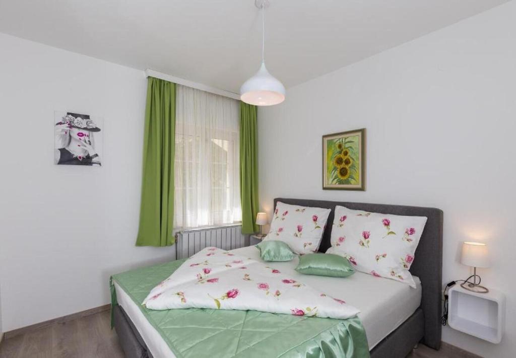 Posteľ alebo postele v izbe v ubytovaní Apartments Ante