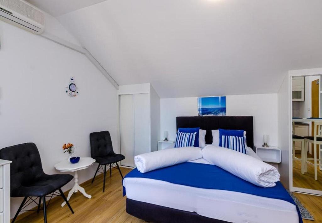 Posteľ alebo postele v izbe v ubytovaní Apartments Ante