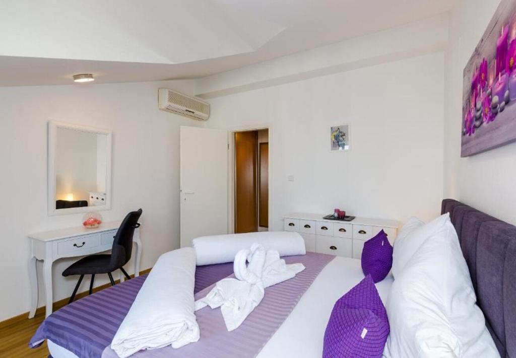 Posteľ alebo postele v izbe v ubytovaní Apartments Ante