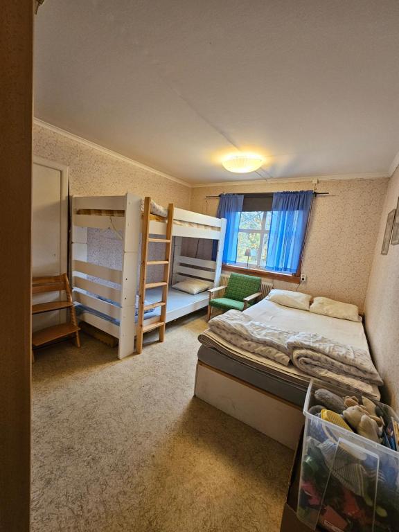Postel nebo postele na pokoji v ubytování Romme stugby