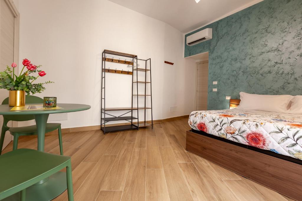 Postel nebo postele na pokoji v ubytování Pasitea Rooms