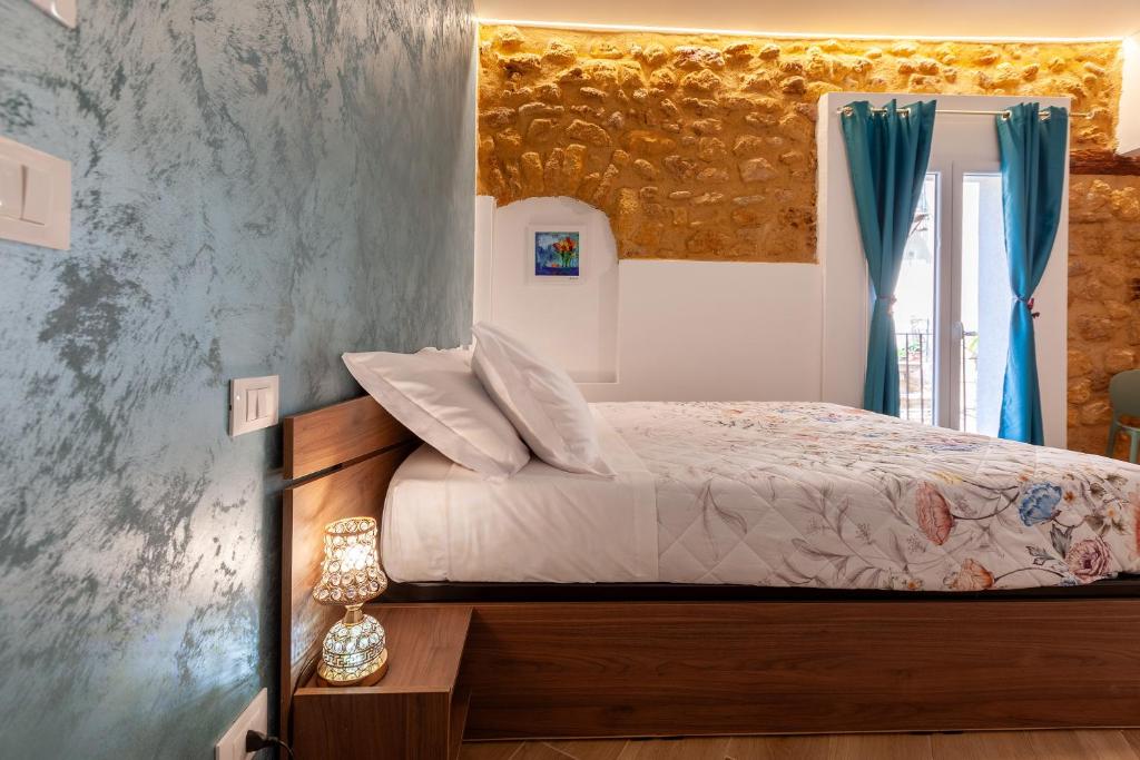 Postel nebo postele na pokoji v ubytování Pasitea Rooms
