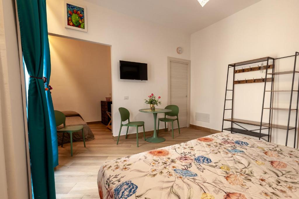 Postel nebo postele na pokoji v ubytování Pasitea Rooms