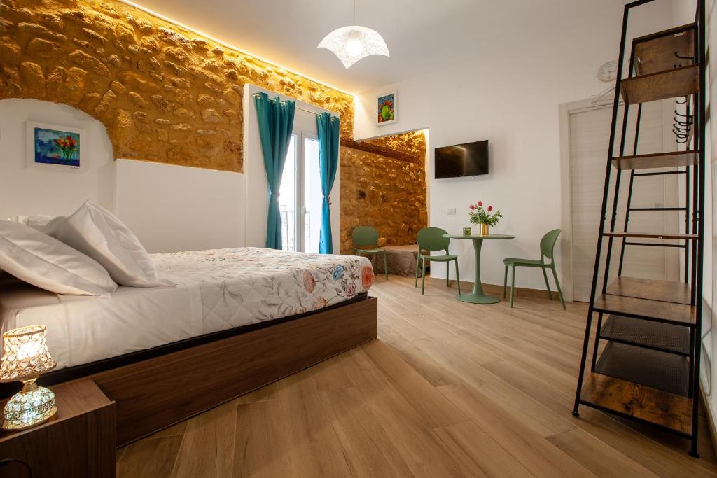 Postel nebo postele na pokoji v ubytování Pasitea Rooms