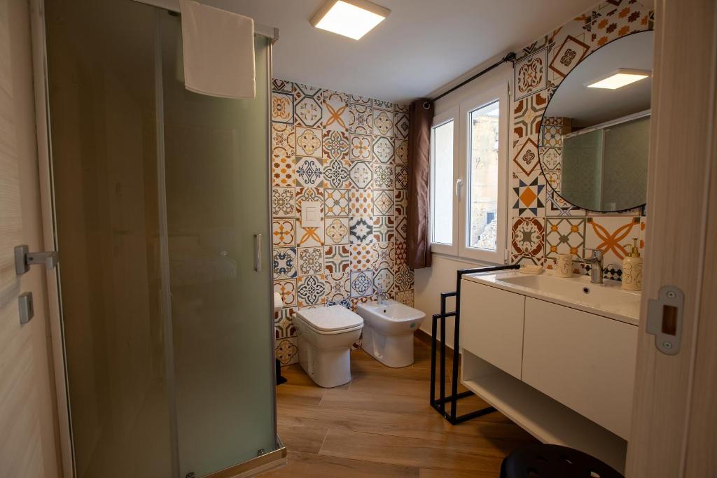 Koupelna v ubytování Pasitea Rooms