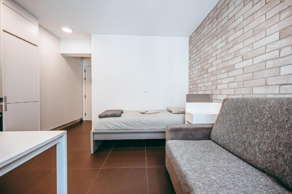 Postel nebo postele na pokoji v ubytování Wake Up Esch City