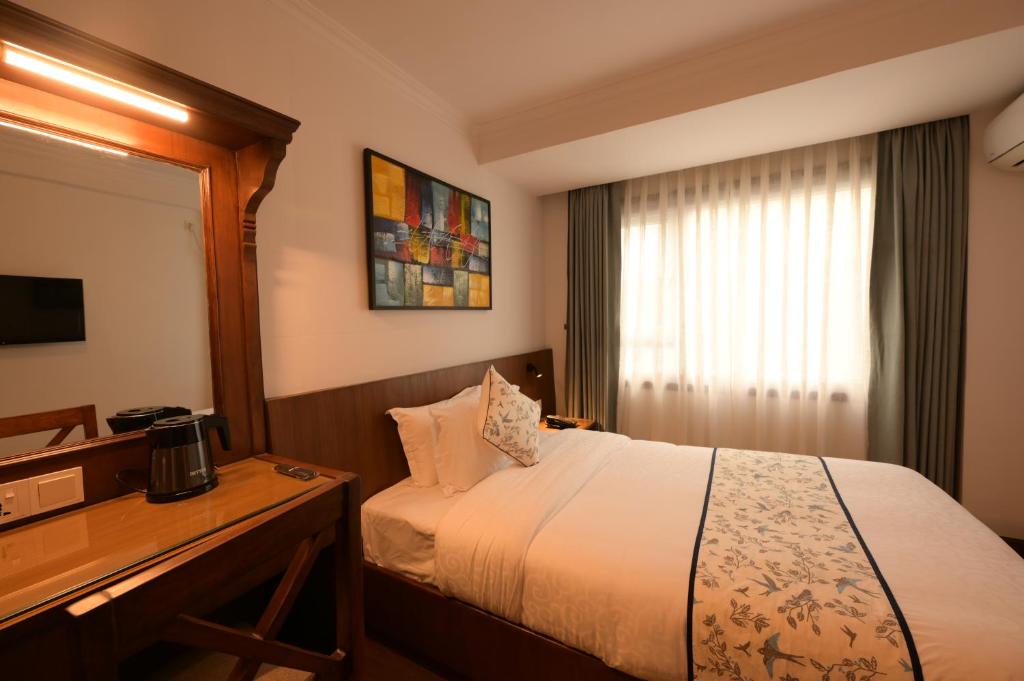 TV a/nebo společenská místnost v ubytování Gallery Park Hotel
