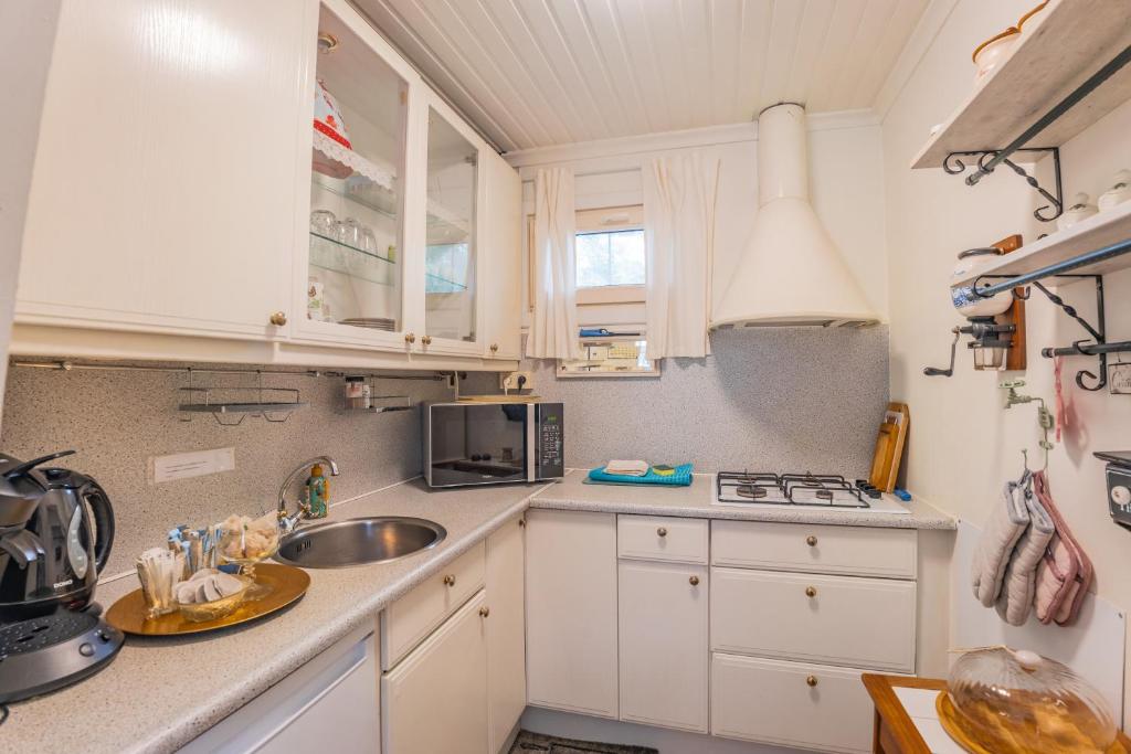 Kuchyň nebo kuchyňský kout v ubytování Chalet 2Relax