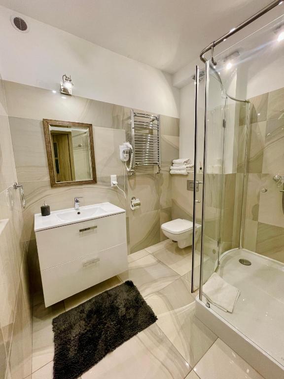Kúpeľňa v ubytovaní Apartamenty Molus na Rynku Staromiejskim