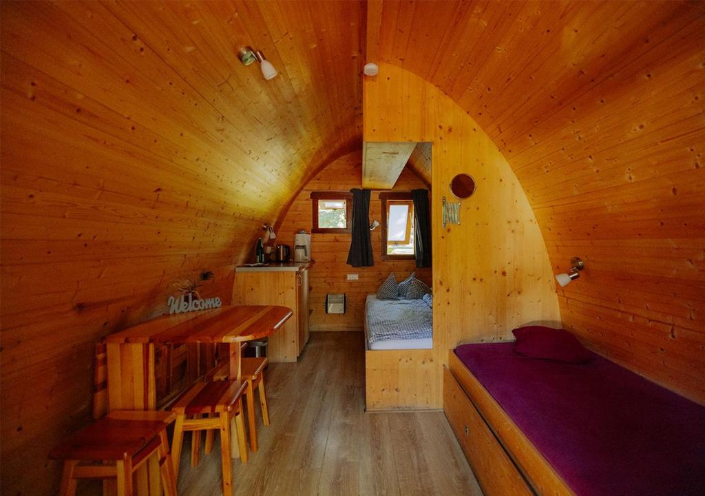Postel nebo postele na pokoji v ubytování AZUR Waldcamping Auwaldsee