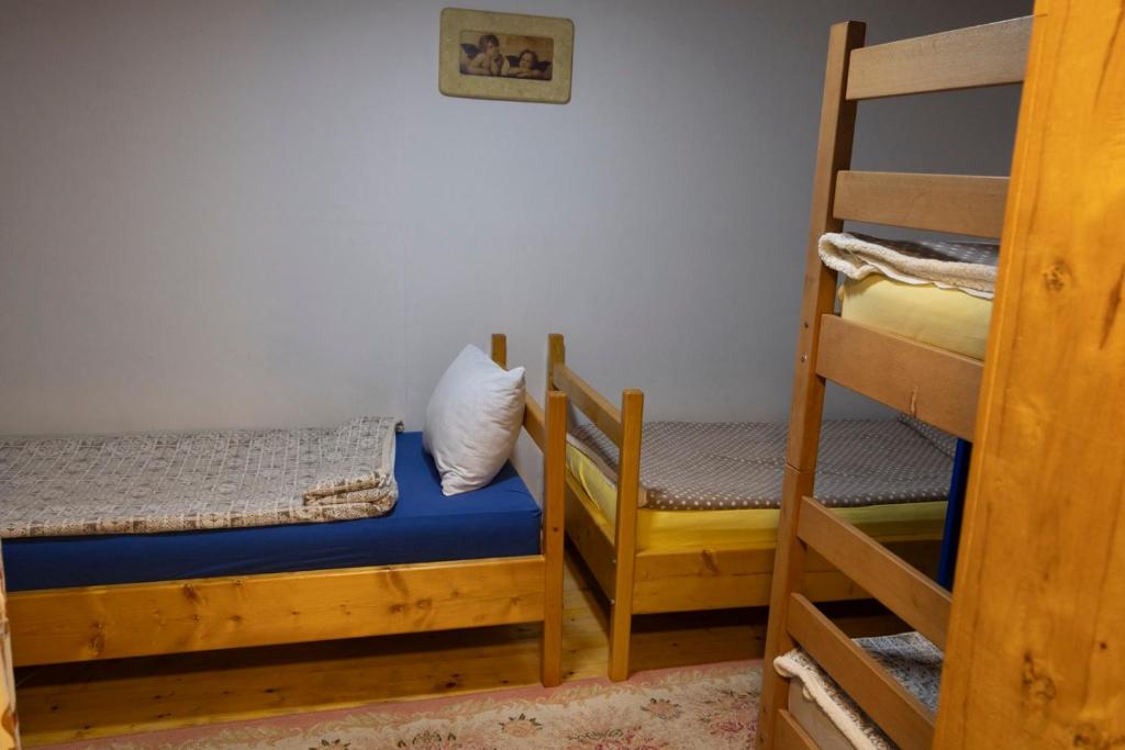 Letto o letti in una camera di Zimska idila