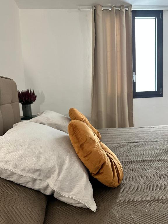 Postel nebo postele na pokoji v ubytování Dimora Ferdinandea