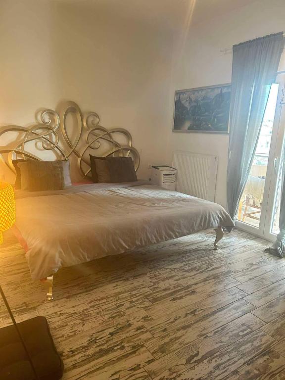 Postel nebo postele na pokoji v ubytování Flat in Makrygialos
